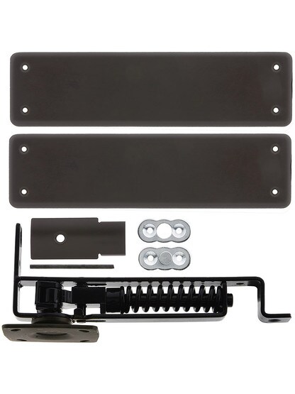 Heavy Duty Swinging Door Floor Hinge With Solid Brass Cover Plates in Oil Rubbed Bronze.